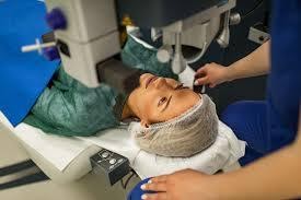 A picture containing person, indoor, hospital room
